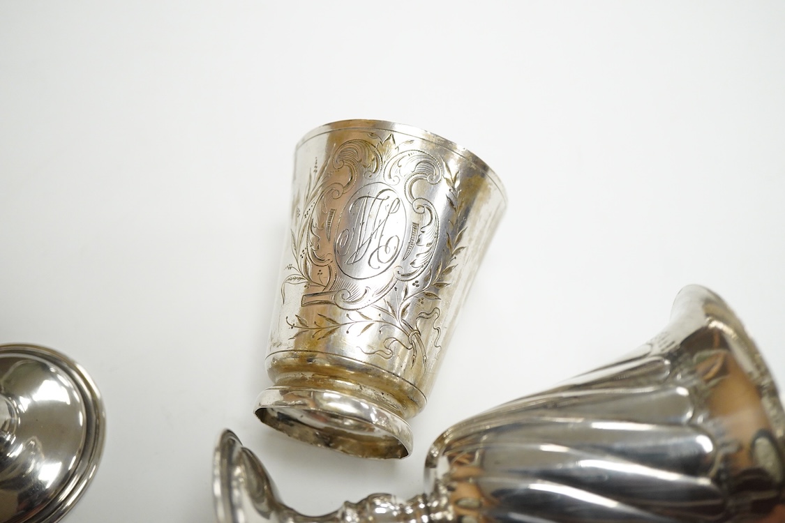 A pair of Turkish? 900 standard white metal goblets, 11.1cm, together with an 800 standard small beaker, 7oz.